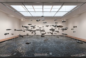 Bruce Nauman, One Hundred Fish Fountain, 2005. Ninety-seven bronze fish of seven different forms, suspended with stainless steel wire from a metal grid, Installation: 300 × 336 inches (762 × 853.4 cm)
