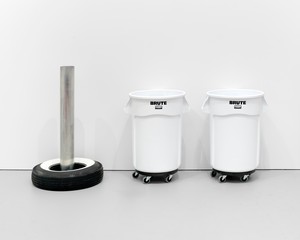 Cady Noland Untitled, 2025. Plastic trash cans on rolling dollies, aluminum tube, and whitewall tire, overall dimensions variable © Cady Noland. Photo: Maris Hutchinson