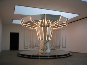 Carsten Höller, Carousel Mirror, 2005. Mirrors mounted on medium-density fiberboard panels, lightbulbs, stainless steel seats, stainless steel chains, steel construction, electric motor, and cables, 295 ¼ × 185 × 185 inches (750 × 470 × 470 cm) Installation at Gagosian, Britannia Street, London © Carsten Höller