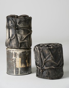 Christo, Wrapped Cans, 1958. Fabric, rope, lacquer, paint, sand, and cans, in 3 parts, each: 5 × 4 ⅛ × 4 ⅛ inches (12.5 × 10.5 × 10.5 cm) © Christo and Jeanne-Claude Foundation. Photo: Wolfgang Volz