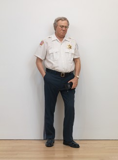 Duane Hanson, Security Guard, 1990 Autobody filler polychromed in oil, mixed media, and accessories, 71 × 26 × 13 inches (180.3 × 66 × 33 cm)© 1990 Estate of Duane Hanson/Licensed by VAGA at Artists Rights Society (ARS), New York. Photo: Rob McKeever