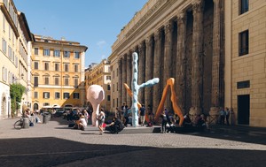 Franz West, Room in Rome, 2010. Lacquered aluminum, in 3 parts, pink: 118 ⅛ × 49 ¼ × 49 ¼ inches (300 × 125 × 125 cm), orange: 145 ⅝ × 196 ⅞ × 98 ⅜ inches (370 × 500 × 250 cm), blue: 200 ¾ × 106 ¼ × 78 ¾ inches (510 × 270 × 200 cm) Installation view, Franz West: Room in Rome, Piazza di Pietra, Rome, September 16–October 16, 2010 © Archiv Franz West and © Estate Franz West