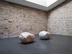 Giuseppe Penone, Essere fiume 7 (To Be a River), 2000. River stone and quarry stone of white Carrara marble, in 2 parts, each: 18 ⅞ × 29 ½ × 24 ⅞ inches (48 × 75 × 63 cm), installed at Whitechapel Gallery, London, September 4, 2012–October 27, 2013 © 2019 Artists Rights Society (ARS), New York/ADAGP, Paris. Photo © Archivio Penone