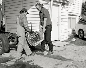 Jeff Wall, Men move an engine block, 2008. Gelatin silver print, 54 ½ × 69 ½ inches (138.5 × 176.5 cm) © Jeff Wall