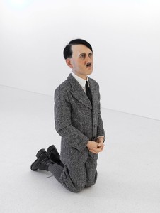 Maurizio Cattelan, Him, 2001. Polyester, wax, and clothing, 39 ¾ × 16 ⅛ × 20 ⅞ inches (101 × 41 × 53 cm) © Maurizio Cattelan