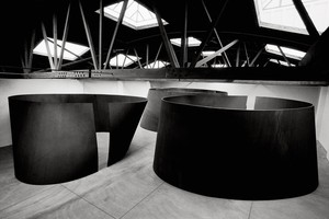 Installation view, Richard Serra: Torqued Ellipses, Dia Center for the Arts, New York, 1997–98. Left: Torqued Ellipse I (1996), right: Torqued Ellipse II (1996), back: Torqued Ellipse (1997). Artwork © 2018 Richard Serra/Artists Rights Society (ARS), New York. Photo: Dirk Reinartz