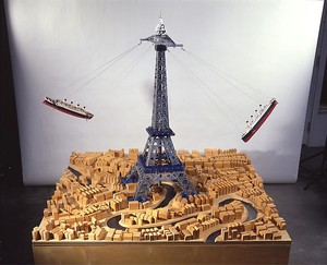 Chris Burden, Another World II, 1993. Wood base, wood block buildings, glass river, 2 Titanic model boats, Meccano building parts, motor, 65 × 59 × 59 inches (165.1 × 149.9 × 149.9 cm)