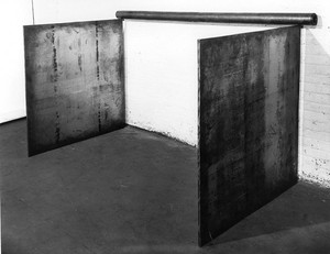 Richard Serra, No. 5, 1969. Lead antimony, 2 plates: 48 × 48 inches each (122 × 122 cm), Pole: 7 feet (213 cm), 3 ½ inches in diameter (9cm). Private collection