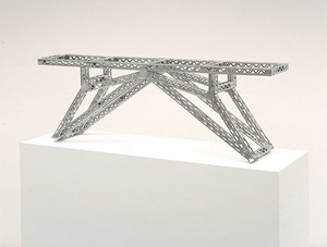 Chris Burden, Indo-China Bridge, 2002. Stainless steel reproduction Mysto Type I Erector parts, 15 ¼ × 45 × 8 ½ inches (38.7 × 114.3 × 21.6 cm), edition of 12 © Chris Burden/Licensed by The Chris Burden Estate and Artists Rights Society (ARS), New York. Photo: © Douglas M. Parker Studio