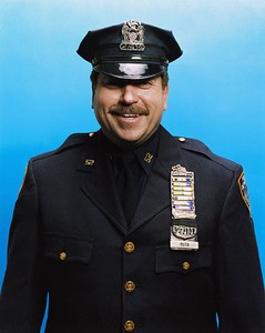 Roe Ethridge, NYPD Officer Damon Ruta (Ret.), 2006. Chromogenic print, 40 × 32 ½ inches (101.6 × 82.6 cm), edition of 5