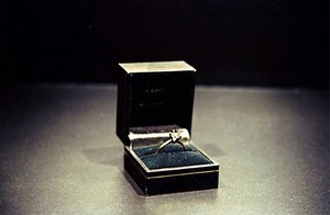 Jill Magid, Auto Portrait Pending, 2005 (detail). Gold ring with empty setting, ring box, corporate and private contracts, Dimensions variable