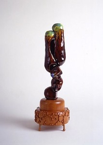 Paul Noble, nine, 2006–07. Glazed ceramic, pear wood base, 25 ¼ × 7 ⅞ × 7 ⅞ inches (64 × 20 × 20 cm)
