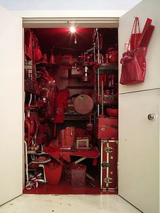 Robert Therrien, No title (red room), 2000–07. Mixed media (approx. 888 red objects housed in a closet with doors), 96 × 77 × 105 inches overall (243.8 × 195.6 × 266.7 cm)