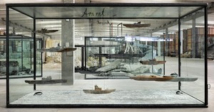 Anselm Kiefer, Ararat, 2010. 9 lead boats, wire, and oil, emulsion, acrylic, shellac, and clay on canvas, in inscribed glass and steel vitrine, 114 ⅛ × 216 ½ × 90 ⅝ inches (290 × 550 × 230 cm) © Anselm Kiefer
