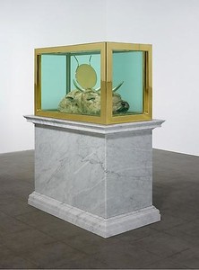 Damien Hirst, End of an Era, 2009. Bull's head, gold, gold-plated steel, glass, and formaldehyde solution, with Carrara marble plinth, 84 × 67 ⅜ × 38 ¼ inches (213.4 × 171 × 97.2 cm) © Damien Hirst and Science Ltd. All rights reserved, DACS 2010