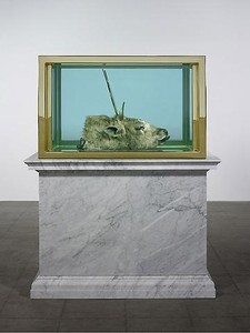 Damien Hirst, End of an Era, 2009. Bull’s head, gold, gold-plated steel, glass, and formaldehyde solution, with Carrara marble plinth, 84 × 67 ⅜ × 38 ¼ inches (213.4 × 171 × 97.2 cm) © Damien Hirst and Science Ltd. All rights reserved, DACS 2010