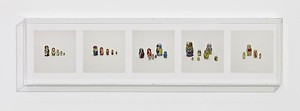 Taryn Simon, NESTING DOLLS (COUNTERFEIT), 2010. 5 archival inkjet prints in 1 Plexiglas box, 9 ¼ × 37 ¼ × 2 ½ inches (23.5 × 94.6 × 6.4cm), edition of 4 Photo by Douglas M. Parker Studio