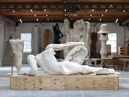 THOMAS HOUSEAGO Reclining Figure (For Rome), 2013 Tuf-Cal, hemp, iron rebar, wood 66 × 148 × 68 inches (167.6 × 375.9 × 172.7 cm) Installation at Thomas Houseago's Studio