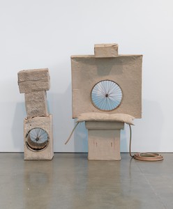 Robert Rauschenberg, Untitled (Early Egyptian), 1974. Cardboard, sand, Day-Glo paint, spoked wheels, pillow, and hose, 80 ¼ × 78 × 36 inches (203.8 × 198.1 × 91.4 cm) © The Robert Rauschenberg Foundation 2014/Licensed by VAGA, New York. Photo: Rob McKeever