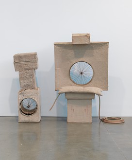 Robert Rauschenberg, Untitled (Early Egyptian), 1974 Cardboard, sand, Day-Glo paint, spoked wheels, pillow, and hose, 80 ¼ × 78 × 36 inches (203.8 × 198.1 × 91.4 cm)© The Robert Rauschenberg Foundation 2014/Licensed by VAGA, New York. Photo: Rob McKeever