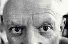 Photograph of Picasso showing the top half of his face.