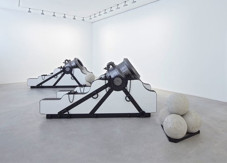 Chris Burden, Pair of Namur Mortars, 2013 Bronze casting of accurate reproduction of 17th-century Namur mortar, in wood and iron cradle, with 4 stone cannonballs; each cannonball, diameter: 18 inches (45.7 cm); overall dimensions variable© Chris Burden/Licensed by The Chris Burden Estate and Artists Rights Society (ARS), New York. Photo: Thomas Lannes