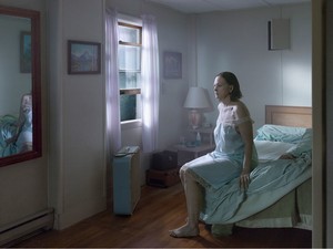 Gregory Crewdson, Seated Woman on Bed, 2013. Digital pigment print, Image size: 37 ½ × 50 inches (95.3 × 127 cm), edition of 3 + 2 APs © Gregory Crewdson