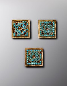 Important collection of ornaments, Tang dynasty (618–907) (detail). Gold inlaid with turquoise, 13 ornaments; each, approx. width: ¾ to 2 inches (2 to 5 cm) Photo: Frédéric Dehaen, Studio Roger Asselberghs