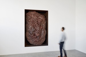Installation view with Michael Heizer, Scoria Negative Wall Sculpture (2007). Artwork © Michael Heizer. Photo: Thomas Lannes