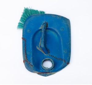 Romuald Hazoumè, Un Bleu, 2018. Plastic and brush, 13 ⅜ × 10 ⅝ × 2 ⅜ inches (34 × 27 × 6 cm) © 2018 Romuald Hazoumè and Artists Rights Society (ARS), New York/ADAGP, Paris. Photo: Zarko Vijatovic