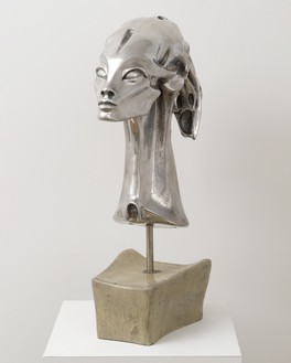 H. R. Giger, Female Head, 1965–98 Aluminum, 20 ⅜ × 6 ⅝ × 11 ⅞ inches (51.8 × 16.8 × 30.2 cm), edition of 23© H. R. Giger Museum, Gruyères, Switzerland. Photo: Rob McKeever
