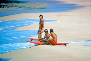 Herbie Fletcher, Gerry Lopez, and Barry Kanaiaupuni, Sunset Beach, Hawaii, 1971. Photo: Jeff Divine, courtesy Fletcher Family Archive