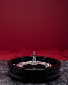 Piero Golia, Still Life (Rotating device), 2019 Decommissioned roulette wheel, motor, and marble, 38 × 64 × 64 inches (96.5 × 162.6 × 162.6 cm)© Piero Golia. Photo: Lucy Dawkins