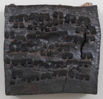 Theaster Gates, Brick Reliquary – Square with Marks, 2020 Wood-fired brick, wood ash, magnesium dioxide, and black stain, 12 × 12 × 4 inches (30.5 × 30.5 × 10.2 cm)© Theaster Gates. Photo: Rob McKeever