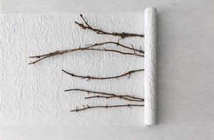 Giuseppe Penone, Impronte di corpi nell’aria (Bodies Imprinted in the Air), 2021. White Carrara marble and bronze, 39 ⅜ × 59 ⅛ × 5 ½ inches (100 × 150 × 14 cm) © 2021 Giuseppe Penone/Artists Rights Society (ARS), New York/ADAGP, Paris