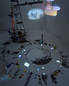 Sarah Sze, Travelers by Streams and Mountains, 2021. Mixed media, including archival pigment prints, video projector, and pendulum, 80 × 141 × 115 inches (203.2 × 358.1 × 292.1 cm) © Sarah Sze. Photo: Sarah Sze Studio