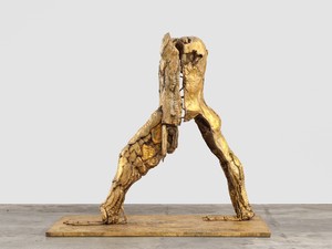 Thomas Houseago, Gold Walking Man, 2021. Bronze, 77 × 40 ⅞ × 84 ⅝ inches (195.6 × 104 × 215 cm), edition 1/3 + 2 AP © Thomas Houseago. Photo: Stefan Altenburger