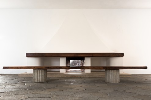 Original walnut and Carrara marble bench conceived in 1941 by Curzio Malaparte in situ at Casa Malaparte, Capri © Malaparte. Photo: Dariusz Jasak