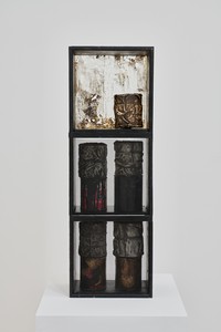 Christo, Shelves, 1958. 9 cans, lacquered fabric, rope, paint, wood, glass, and steel wire mesh, 35 ½ × 11 ⅞ × 7 ⅛ inches (90 × 30 × 18 cm) © Christo and Jeanne-Claude Foundation. Photo: Thomas Lannes