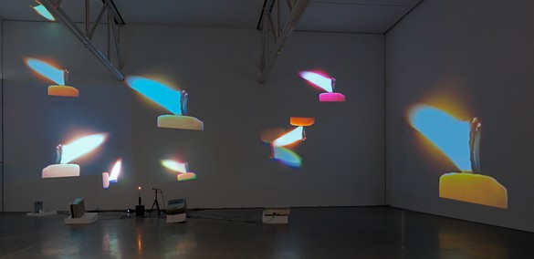 Nam June Paik, One Candle, Candle Projection, 1988–2000 Candle, candle monitoring device, color monitor, closed-circuit video camera,video projectors, and video distribution amplifier, overall dimensions variable© Nam June Paik Estate. Photo: Rob McKeever