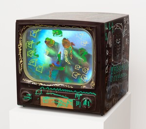 Nam June Paik, Untitled, 2005. Single-channel video (color, silent), vintage television, permanent oil marker, and acrylic paint, 17 ⅝ × 17 ⅞ × 20 ¼ inches (44.8 × 45.4 × 51.4 cm) © Nam June Paik Estate. Photo: Rob McKeever