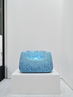 Installation view with Marc Newson, Cloisonné White and Blue Chair (2022) Artwork © Marc Newson. Photo: Thomas Lannes