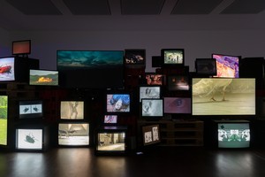 Installation view with Douglas Gordon, Pretty much every film and video work from about 1992 until now... (1999–). Artwork © Studio lost but found/VG Bild-Kunst, Bonn, Germany, 2024. Photo: Lucy Dawkins