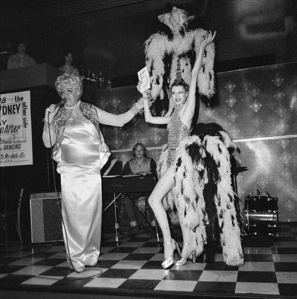 Nan Goldin, Marlene as a showgirl on stage with Sylvia Sidney, The Other Side, Boston, 1973 Silver gelatin print, 16 × 16 inches (40.6 × 40.6 cm)© Nan Goldin