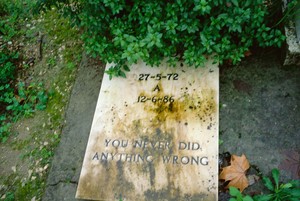 Nan Goldin, Gravestone in pet cemetery, Lisbon, 1998. Archival pigment print, 41 × 61 inches (104 × 154.8 cm), edition of 3 + 2 AP © Nan Goldin