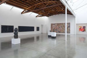 Installation view. Artwork, floor, left to right: © Theaster Gates, © Kahlil Robert Irving; wall, left to right: © Cy Gavin, © Cameron Welch, © Amanda Williams. Photo: Jeff McLane