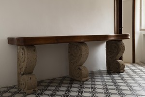 Original walnut and tuff console table conceived in 1941 by Curzio Malaparte in situ at Casa Malaparte, Capri. © Malaparte. Photo: Dariusz Jasak