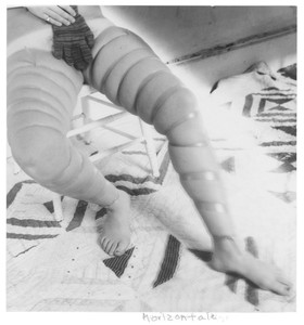 Francesca Woodman Horizontale or Horizontal Legs, 1976. Lifetime gelatin silver print mounted on mat board, sheet: 5 ¼ × 4 ⅞ inches (13.3 × 12.4 cm), mat board: 14 × 10 ¾ inches (35.4 × 27.3 cm) © Woodman Family Foundation/SIAE, Rome