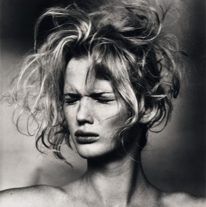 Irving Penn Young Woman Hearing Noise, New York, 2003. Gelatin silver print, 10 ¼ × 10 ¼ inches (25.9 × 25.9 cm), edition of 3 © Condé Nast