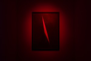 James Turrell Red Triangle (Large Transmission Hologram), 2009. Transparent gelatin emulsion on glass, 55 ⅛ × 40 ¼ × 2 ½ inches (140 × 102.2 × 6.4 cm) © James Turrell. Photo: Ringo Cheung